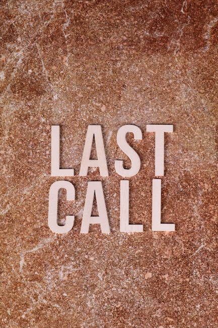 A close-up image of a textured reddish-brown surface, possibly a concrete or stone floor, with the words 'LAST CALL' displayed in large, bold, white capital letters centered on the surface. The backgr